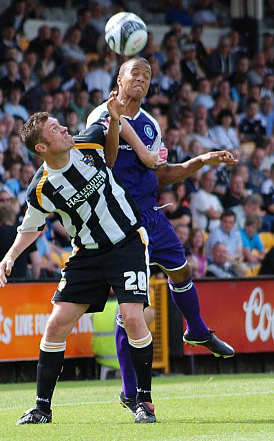 Thompson wins a header against Geoff Horsfield.