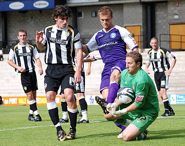 Chris Martin gathers the ball in front of Wiseman.