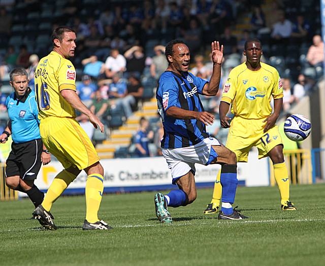 O'Grady flicks the ball through the Torquay defence.