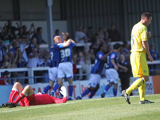 Despair for Torquay as Dagnall opens the scoring.