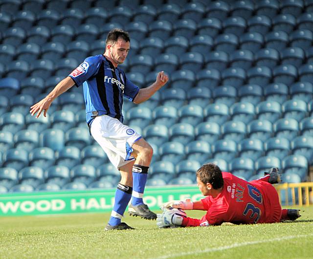 Poke denies Dagnall his hat-trick late on.