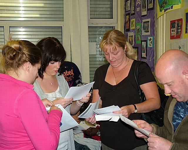 Vicky Mills (16A*-C) with her parents