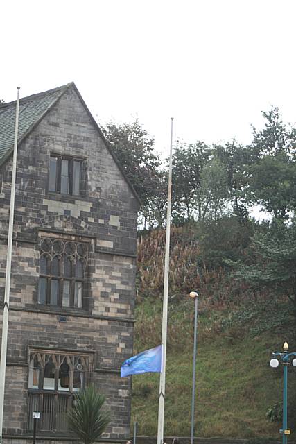 The peace flag is raised outside the Town Hall.