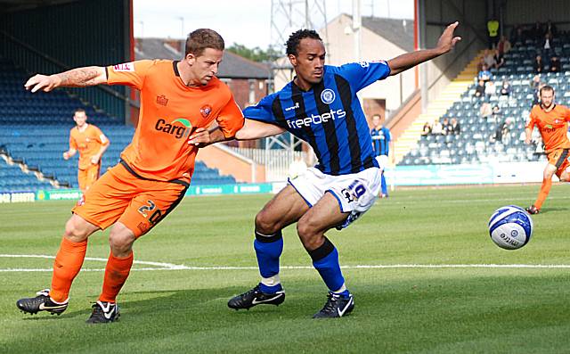 O'Grady holds off Darren Jones in the Hereford box.