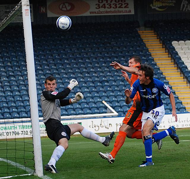 Buckley's close range effort comes back off the woodwork.