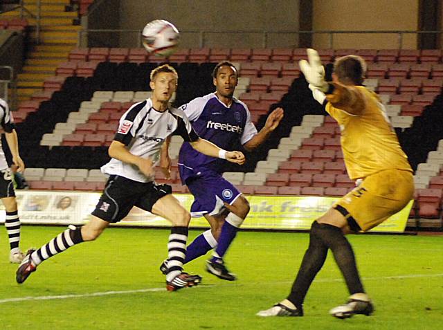 Whaley provides the perfect cross for O'Grady to double Rochdale's lead.