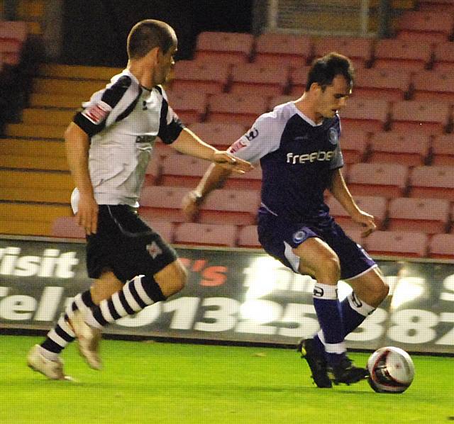 Chris Dagnall makes progress down the left channel.