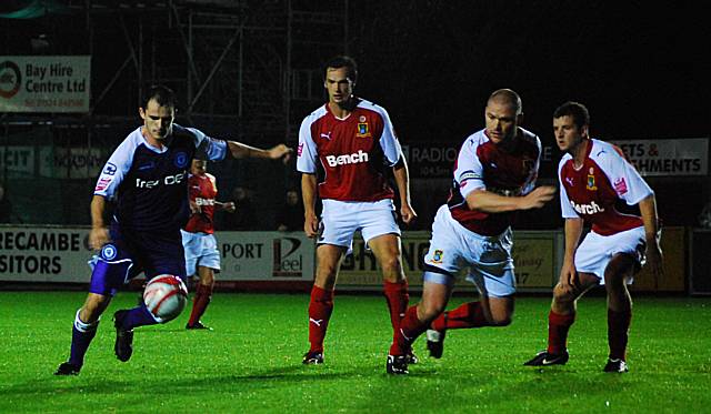 Dagnall looks to give Dale an injury time winner but his shot is saved by the legs of Roche.