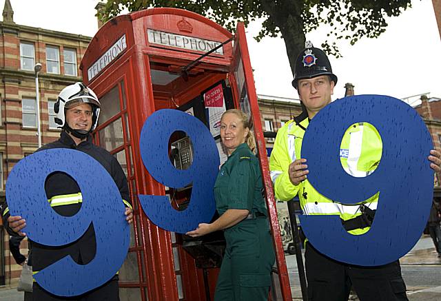 Fire officer Rob McDonagh, ambulance technician Sue Richardson and PC Darren Prince promote 999 Day.