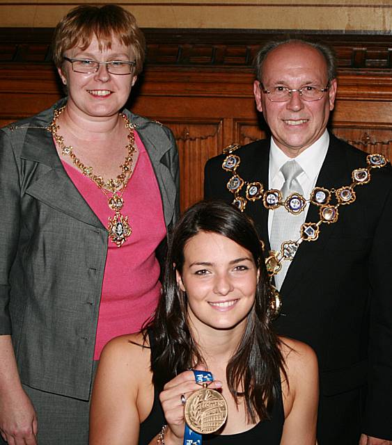 Rochdale Mayor Councillor Keith Swift and Mayoress Sue Etchells with Keri-Anne Payne holding her World Championship gold medal.