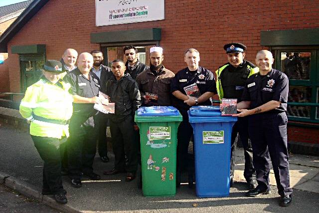 Residents outside the Deeplish Community Centre alongside the partner agencies involved