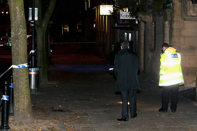 Scene of crime officers in Town Hall Square - looking down from the Flying Horse to the Litten Tree