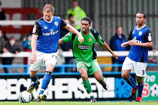 Rochdale 3 - 2 Dagenham and Redbridge<br />
Craig Dawson pursued by Gavin Tomlin