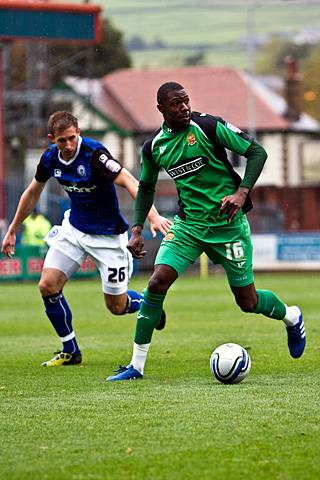 Rochdale 3 - 2 Dagenham and Redbridge<br />
Craig Dawson chases Bas Savage