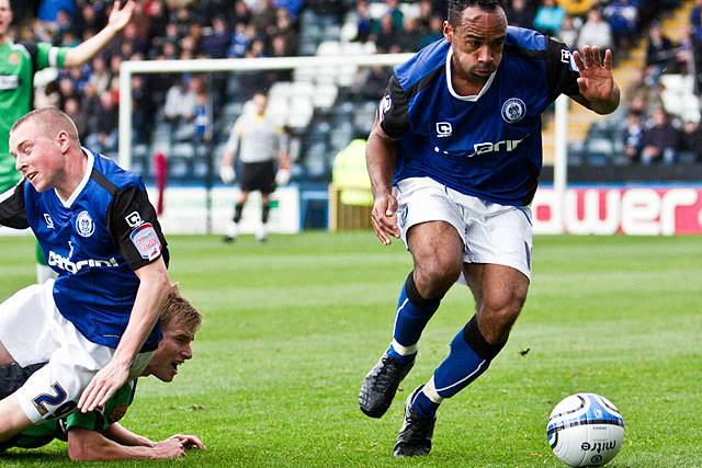 Rochdale 3 - 2 Dagenham and Redbridge<br />
Chris O'Grady mops up after Nicky Adams is tackled