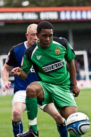 Rochdale 3 - 2 Dagenham and Redbridge<br />
Gavin Tomlin shepherded by Jason Kennedy