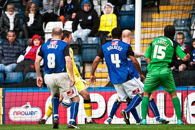 Rochdale 3 - 2 Dagenham and Redbridge<br />
Scannell scores for Dagenham as Jones, Kennedy, Holness and Lillis can only watch as the ball crosses the line