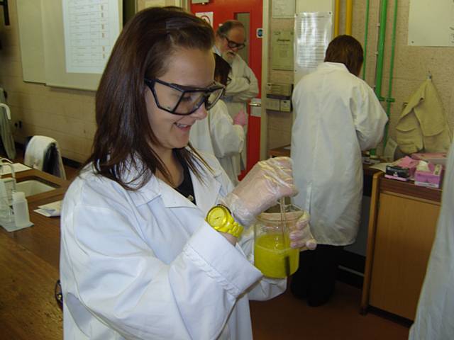 A Hopwood Hall College beauty student learning the science behind beauty