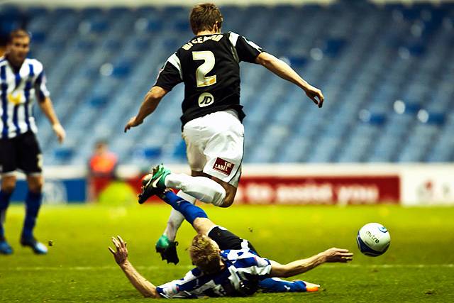 Sheffield Wednesday 2 - 0 Rochdale<br />Gary Teale trips Dale full back Scott Wiseman as he threatens to break clear