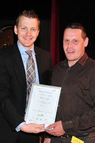 Andrew Payne (right) receiving an award from Skills 4 U in the summer