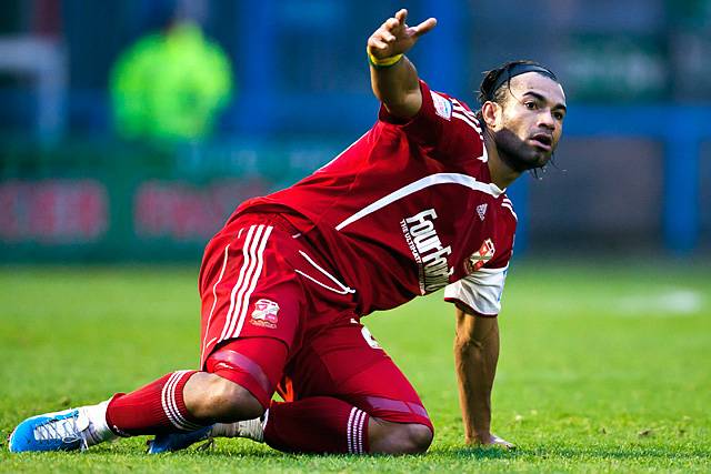 Rochdale 3 - 3 Swindon Town<br />Thomas Dossevi appeals for a free kick