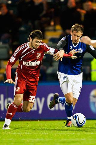 Rochdale 3 - 3 Swindon Town<br />Charlie Austin and Craig Dawson both determined to win the ball