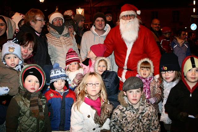 Father Christmas surrounded by children at the Littleborough Christmas lights switch on