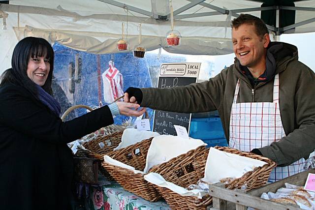 A happy customer at the Littleborough Farmers Market