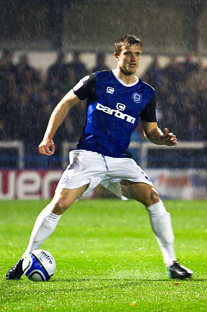 Rochdale v Oldham Athletic – abandoned due to torrential rain rendering the playing surface dangerous -  a soaking Scott Wiseman