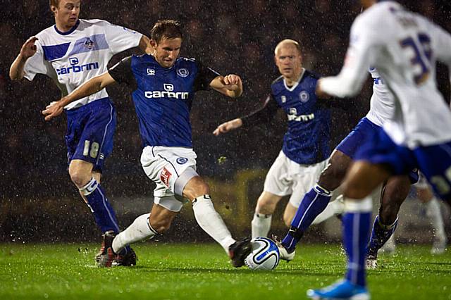 Rochdale v Oldham Athletic – abandoned due to torrential rain rendering the playing surface dangerous - Dawson does his best on the difficult surface