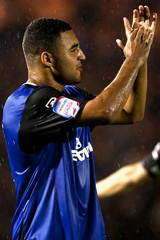 Rochdale v Oldham Athletic – abandoned due to torrential rain rendering the playing surface dangerous - Marcus Holness shows his appreciation to the Dale fans for turning out in the dreadful weather