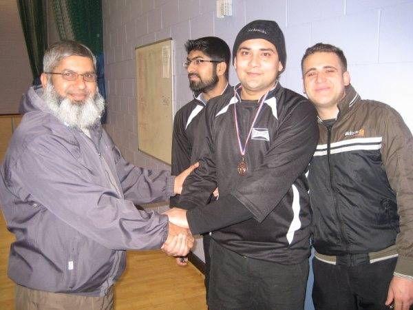 Yasir of Stoney Stars receiving his man of the match award from Haji Zafar committe member of RSCL.