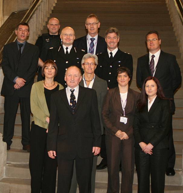 Michael Cross from the Rochdale Youth Offending Team, Sgt Jay Beeken, John Crawforth of the Greater Manchester Probation Trust, Assistant Chief Constable Terry Sweeney, Chief Superintendent John O’Hare, Sgt Paul Walsh, Jennet Peters, Joyce Boyd, Maria Albuquerque-Neale, Caroline Page and Councillor Ted Flynn at the launch of Integrated Offender Management Team.