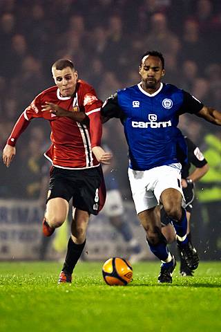 Rochdale v FC United of Manchester - Chris O'Grady tussles with Jake Cotterell