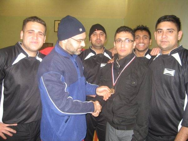 Shakir receives his man of the match award from Abdul Quyyom, Chief organiser of RPCL.