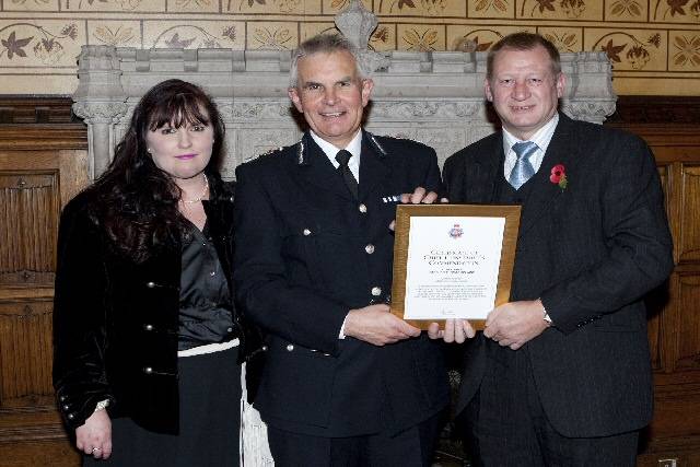 Former PC Stephen Splaine with Catherine Mitchell and Greater Manchester Police's Chief Constable, Peter Fahy