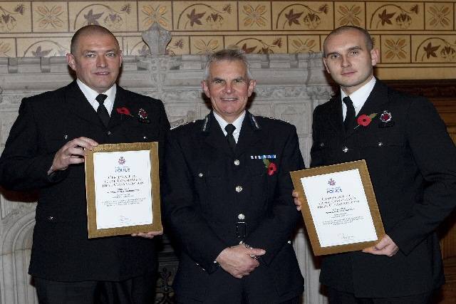 PCs Mark Lutkevitch and Russell Warburton with Greater Manchester Police's Chief Constable, Peter Fahy