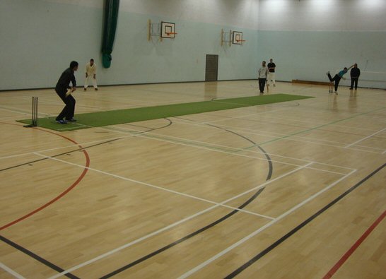 Action from the Sports For All indoor cricket tournament.