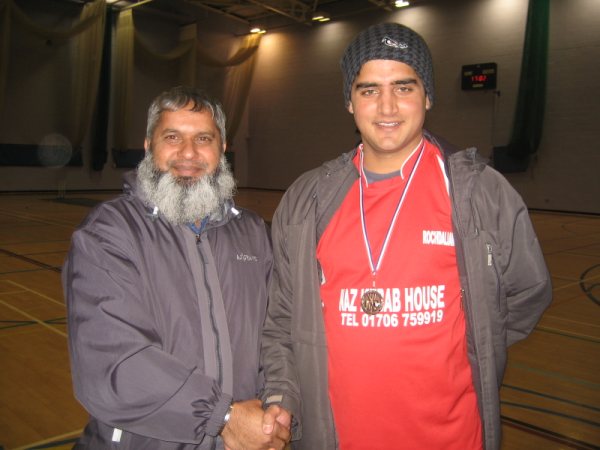 S. Khan of Rochdalians receiving Man of the match medal from Haji Zafar (Playing Committee member of RSCL).