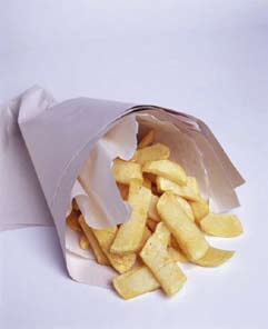 Milnrow Village Chippie is going for the perfect portion of chips.