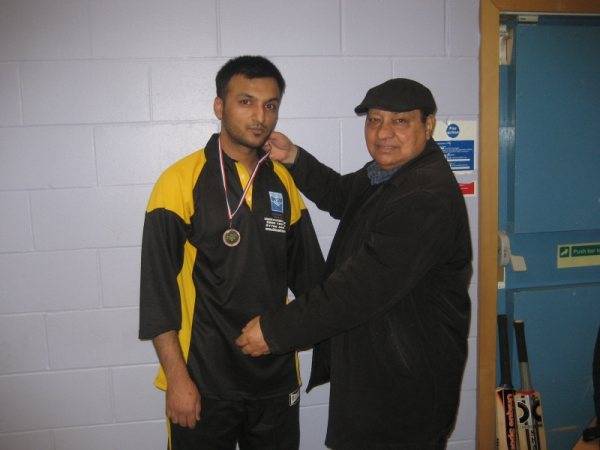 Aqeel of Max XI receiving Man of the match medal from Umpire Mr Amin Tufail