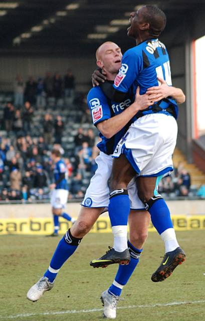 Obadeyi celebrates his first goal for Rochdale with Jason Taylor.