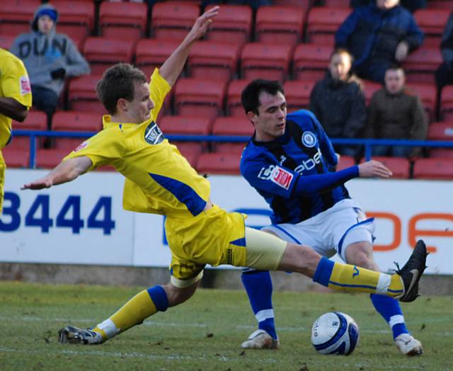 Dagnall turns in the box.