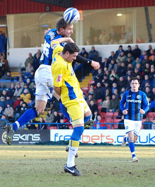 Craig Dawson gets his head to a Dale corner.