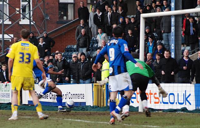 Dagnall's shot falls for O'Grady to tap in.