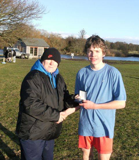 Miss Whitehead and Jackson Cowie celebrate his bronze medal