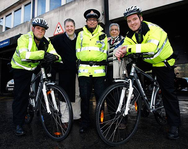 Councillors Mohammad Sharif and Dale Mulgrew with  officers on the new push bikes