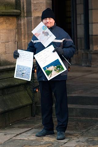 Protester outside Rochdale Town Hall