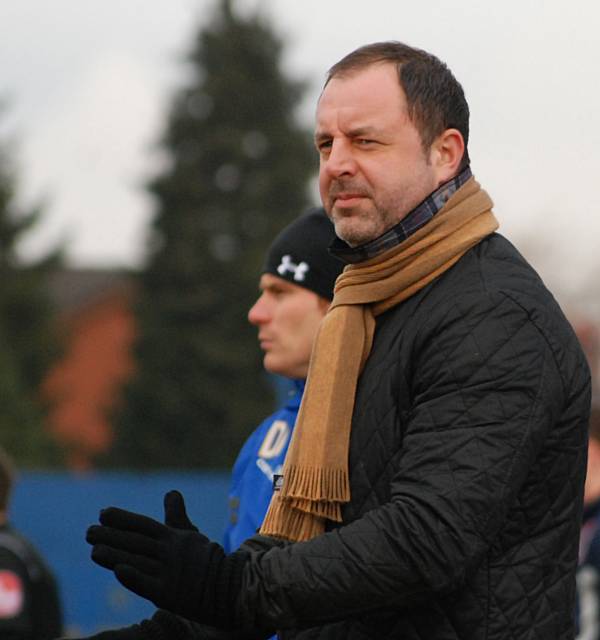 Rochdale manager Keith Hill watches on from the sidelines.