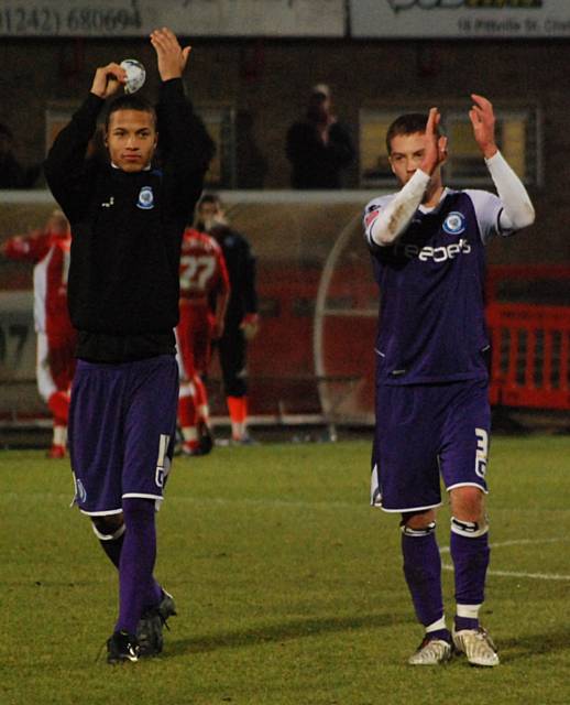 Thompson and Tom Kennedy applaud the Rochdale supporters after the final whistle.